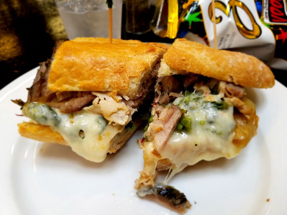 Learn how Giolitti Deli’s porchetta sandwich is made!